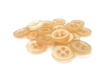 beyaz zemin üzerinde giyim düğmeleri