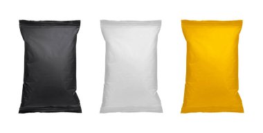 White, black and yellow pillow bag of chips, snacks or candys. Top view. Isolated on white background