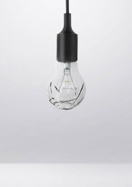 Broken bulb in room studio for advertising