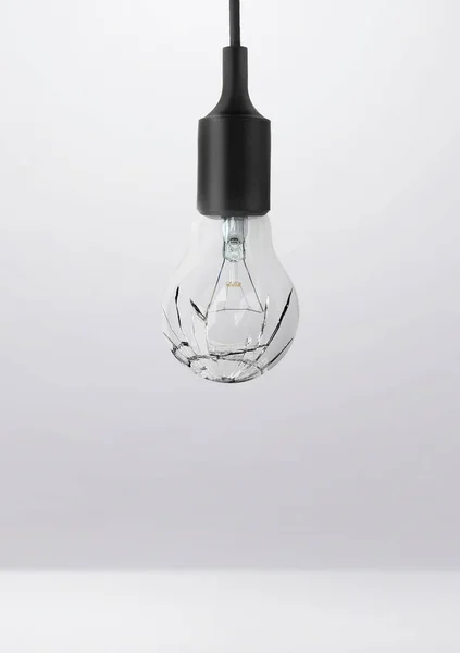 Broken bulb in room studio for advertising