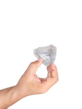 Hand holding natural diamond isolated on white background