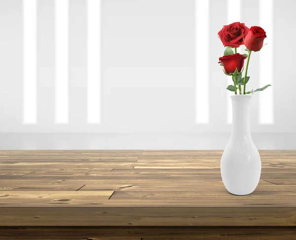 Red rose flowers in vase on wooden table with copy space