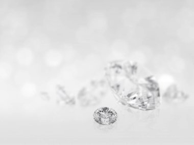 There are still expensive cut diamonds in front of the white background reflecting on the ground, lots of copying.