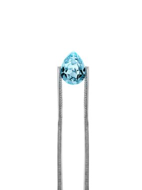 blue diamonds held in tweezers on a white background