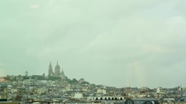 Paris, France, June 2022. Paris skyline with the sacred heart on a rainy day.