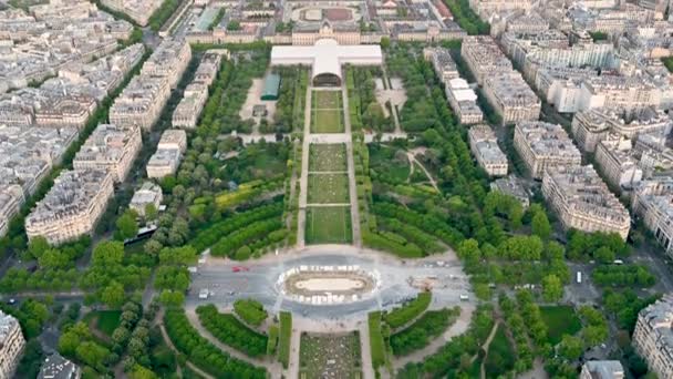 Paris, France, June 2022.Amazing golden hour footage of the city with pov from the top of the Eiffel tower.The tilt movement gives us a complete view of the Champ de Mars.