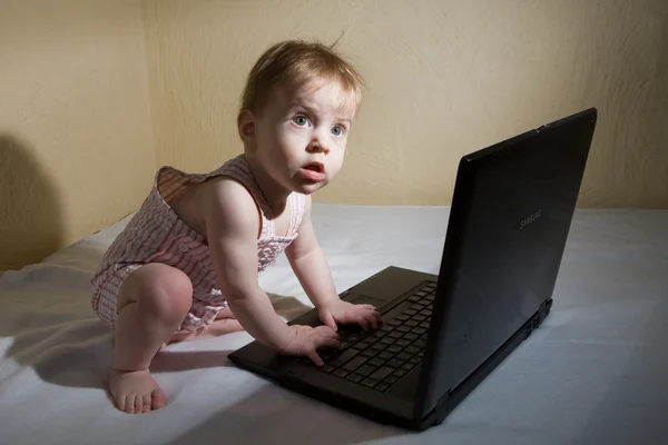 Child using a laptop — Stock Photo, Image