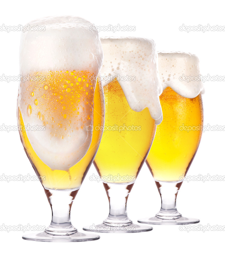 Frosty glass of light beer isolated