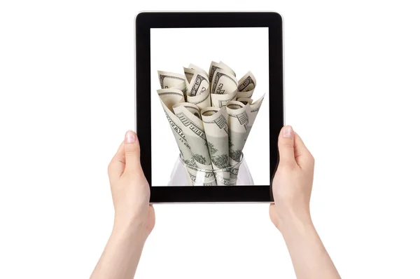 Flor de dinheiro em uma tela Tablet pc — Fotografia de Stock