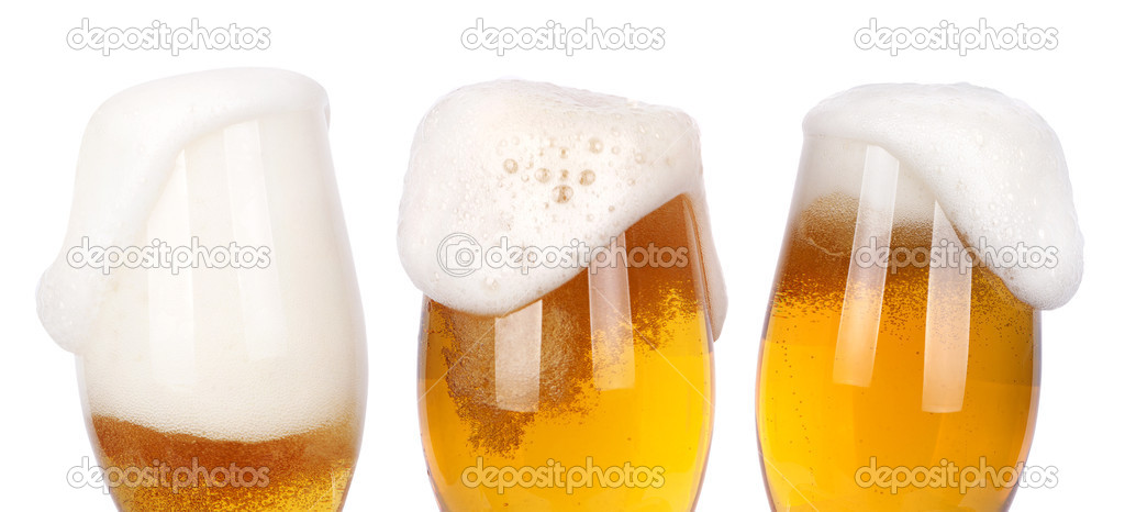 Frosty glass of light beer isolated