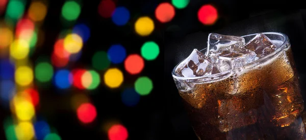 Party background with splashing cola — Stock Photo, Image