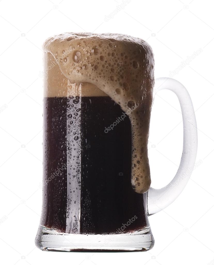 Frosty glass of dark beer isolated