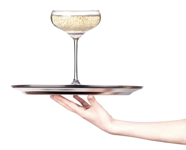 Glass of champagne on a silver tray — Stock Photo, Image