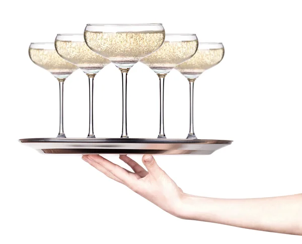 Glass of champagne on a silver tray — Stock Photo, Image
