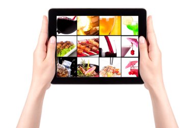 Meat dishes and alcohol on a tablet screen clipart