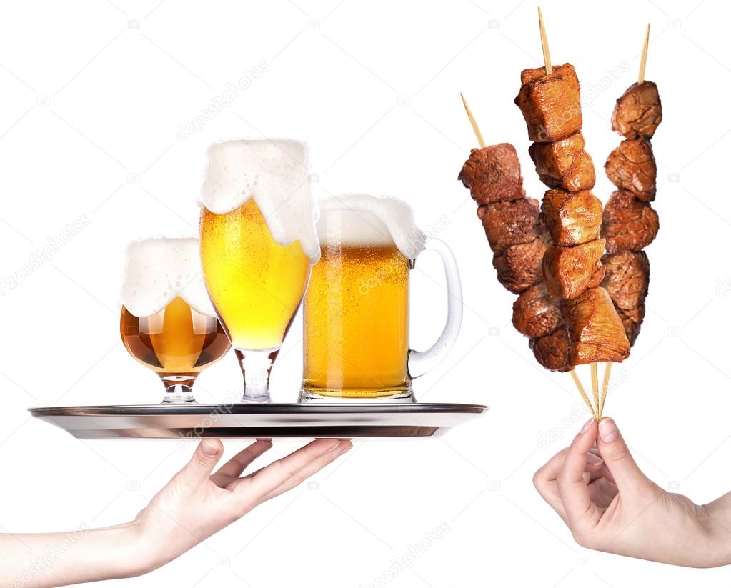 fresh grilled meat dishes with beer