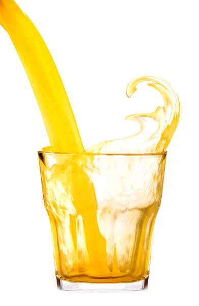 Fresh orange soda or juice drink with splash — Stock Photo, Image