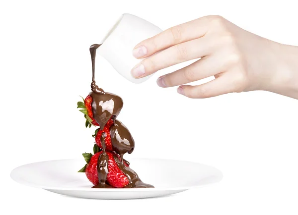 Fragole e cioccolato con mano — Foto Stock