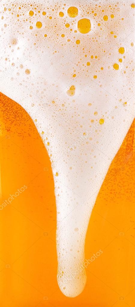 Frosty fresh beer with foam isolated