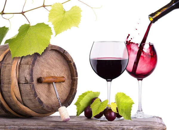Red wine, glass and barrel with grapes — Stock Photo, Image