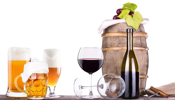 Grapes on a barrel with corkscrew and beer glass — Stock Photo, Image