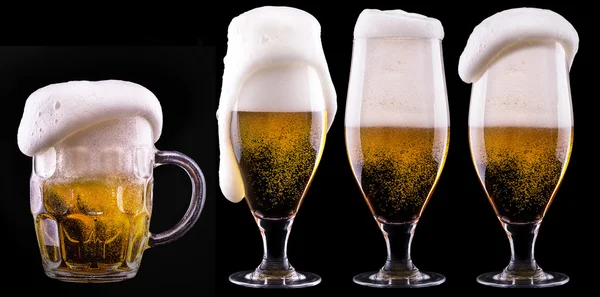 Frosty glass of light beer on black background — Stock Photo, Image