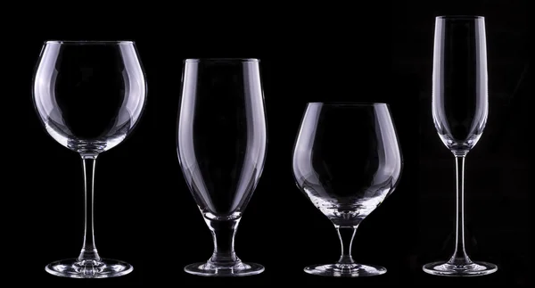 Tomma glas set isolerad på en svart — Stockfoto