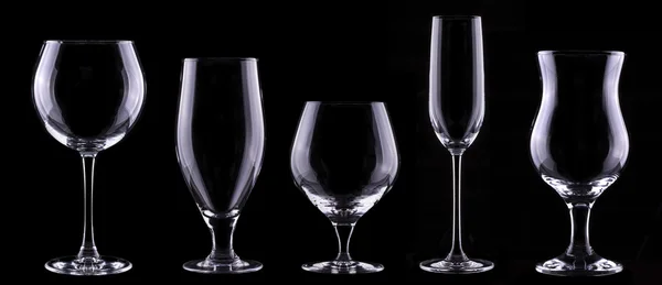 Ensemble de verre vide isolé sur un noir — Photo