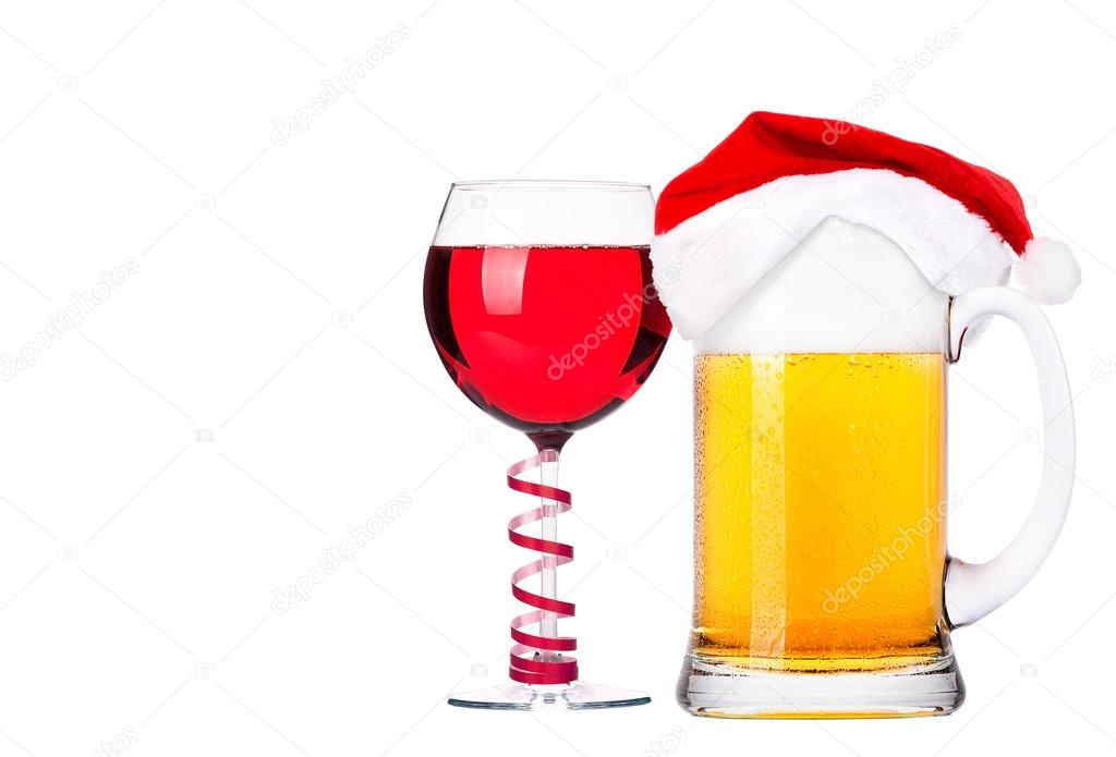 Beer with hat of Santa Claus and cocktail