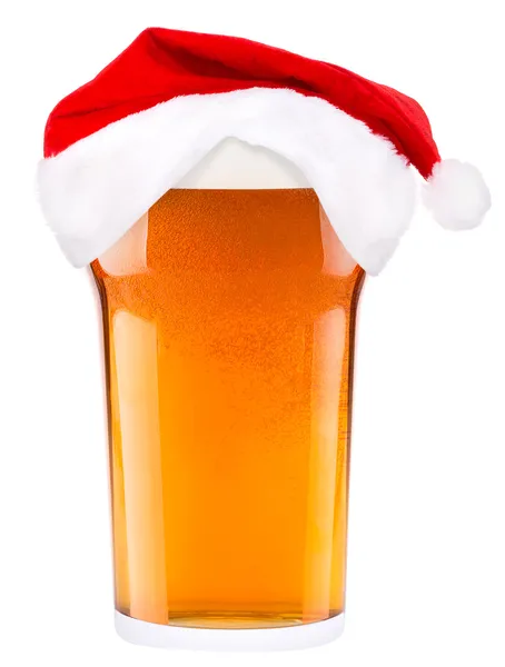 Cerveja e chapéu de Papai Noel — Fotografia de Stock