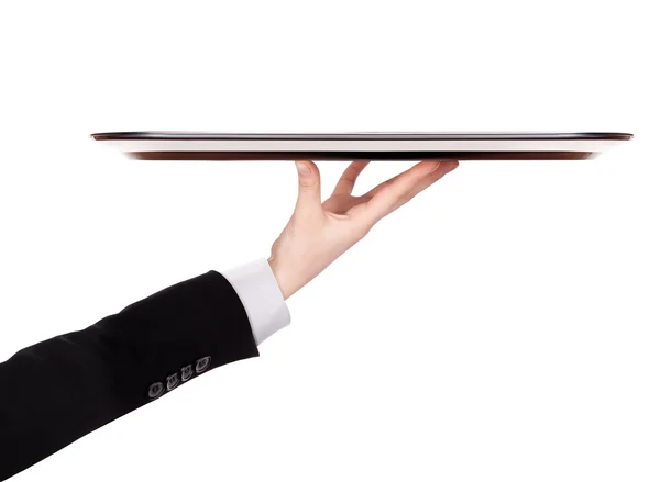 Waiter holding empty silver tray — Stock Photo, Image