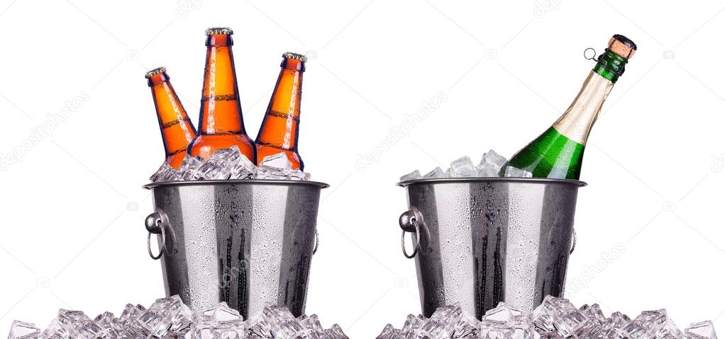 Beer and champagne bottles in ice bucket