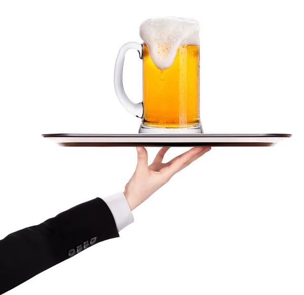 Waiter holding silver tray with beer — Stock Photo, Image