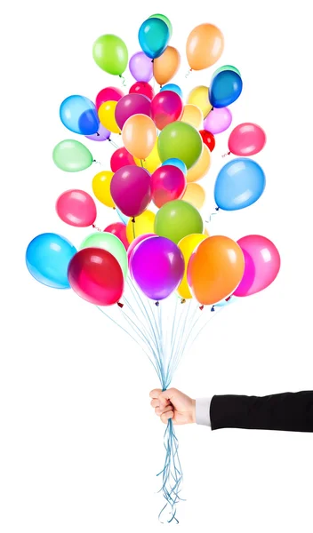Işadamı el ile uçan balonlar — Stok fotoğraf
