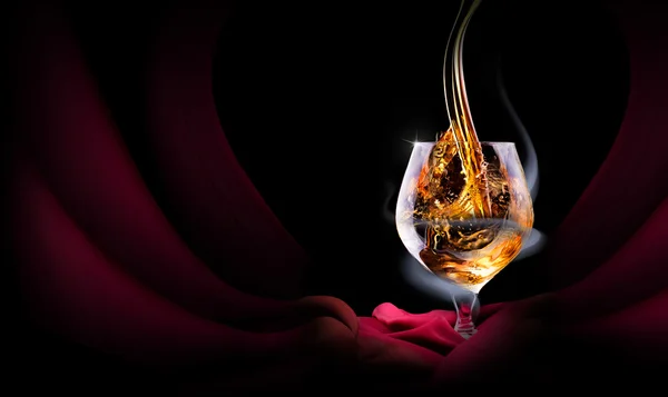 Cognac glass shrouded in a smoke — Stock Photo, Image