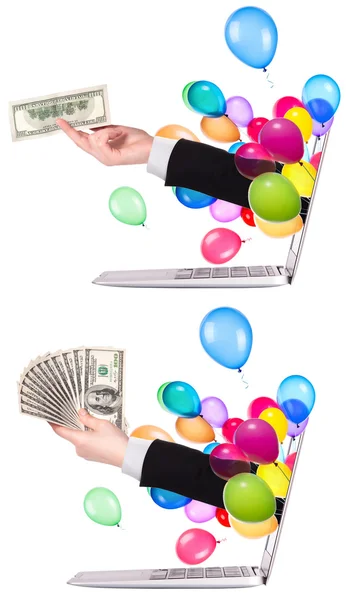 Hand with money and laptop — Stock Photo, Image