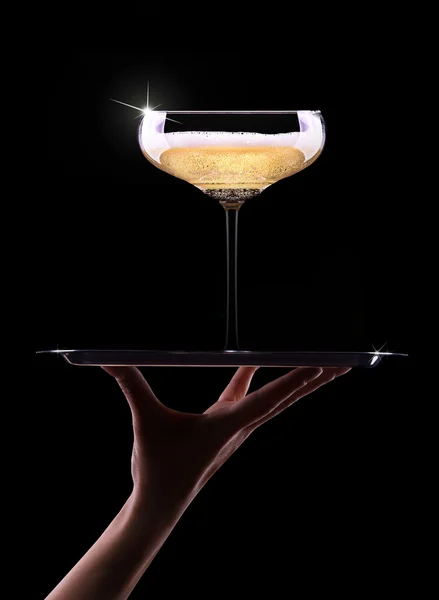 Mano con champagne — Foto Stock