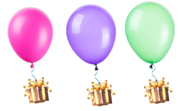 Geschenk opknoping op kleur ballonnen — Stockfoto