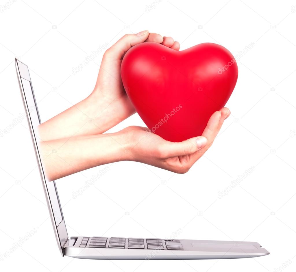 Hand with a heart - gift and laptop