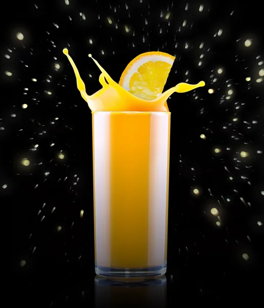 Fresh orange juice in glass with splash — Stock Photo, Image
