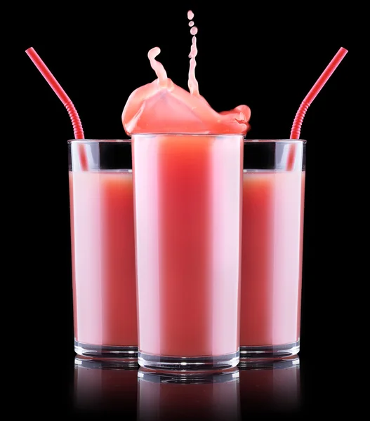 Smoothies jordgubbsplantor i glas med färgstänk — Stockfoto