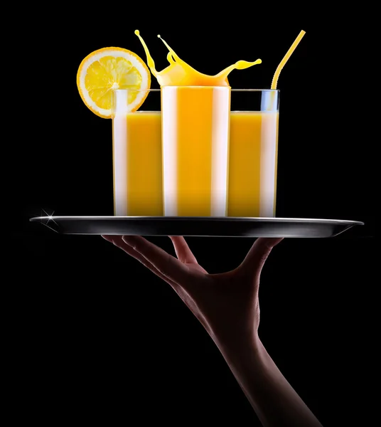 Frischer Orangensaft im Glas mit Spritzer — Stockfoto