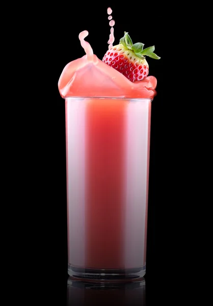 Smoothies of strawberry in glass with splash — Stock Photo, Image