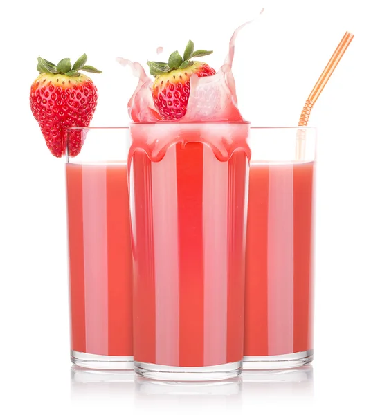 Smoothies jordgubbsplantor i glas med färgstänk — Stockfoto