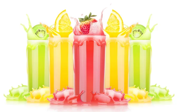 Tasty summer fruit drinks in glass with splash — Stock Photo, Image