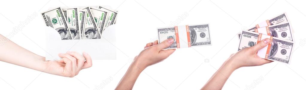 Big packs of dollars in hand isolated