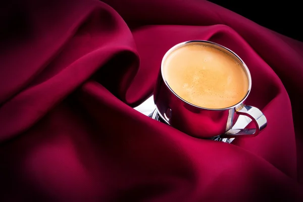 Cup of Coffee with red silk