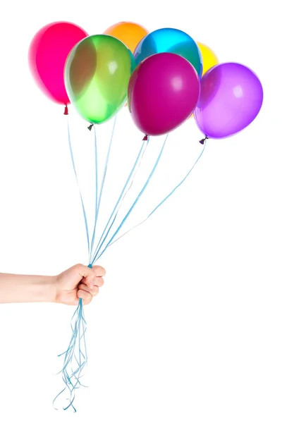 Human hand gives flying balloons — Stock Photo, Image