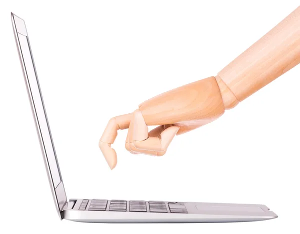 Laptopa ręką drewniany na białym tle — Zdjęcie stockowe