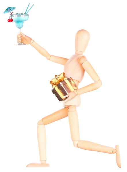 Wooden Dummy with alcohol cocktail and gift — Stock Photo, Image